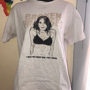 BROKEN PROMISES TEE SHIRT ( turns colors outside )
